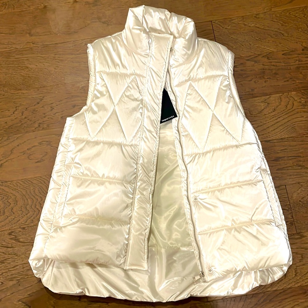 Pearl shiny down vest. New with tags.